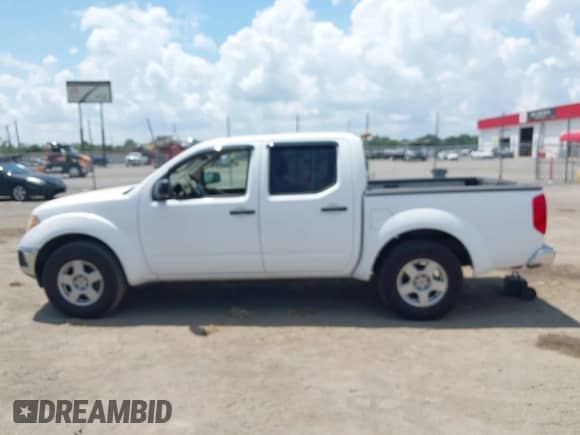 2007 Nissan Frontier SE with VIN 1N6AD07U07C448374, listed as a IAAI auction lot 42805856 with 219,242 mi miles and . Bid and sale history available at DreamBid. Image 14.