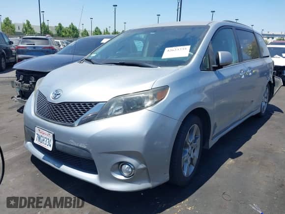 2014 Toyota Sienna SE with VIN 5TDXK3DC8ES417109, listed as a IAAI auction lot 42623735 with 96,234 mi miles and . Bid and sale history available at DreamBid. Image 2.