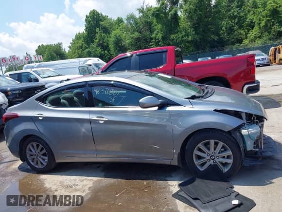 2015 Hyundai Elantra SE z VIN KMHDH4AE2FU223357, wystawiony jako IAAI lot #42376887 z przebiegiem 87 000 mil mil oraz . Historia ofert i sprzedaży dostępna na DreamBid. Obrazek 14.