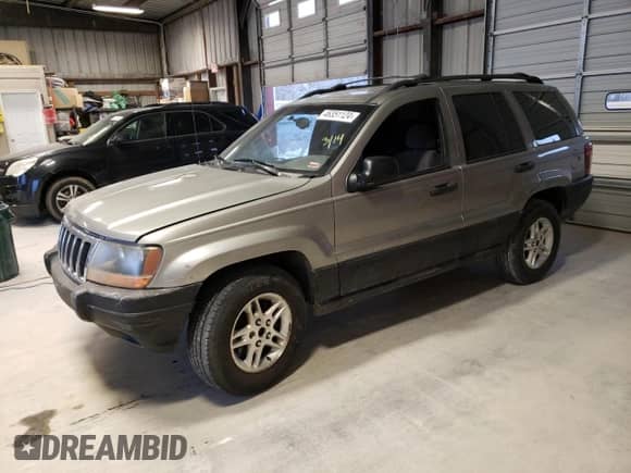 1999 Jeep Grand Cherokee Laredo с VIN 1J4G258S1XC668517, выставлен на аукционе Copart как лот 79958454 с пробегом Не указан миль и Списание • Salvage title. История ставок и продаж доступна на DreamBid. Изображение 1.