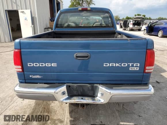 2003 Dodge Dakota SLT z VIN 1D7HG48N03S210327, wystawiony jako Copart lot #68267015 z przebiegiem 204 525 mil mil oraz Szkoda całkowita • Salvage title. Historia ofert i sprzedaży dostępna na DreamBid. Obrazek 6.