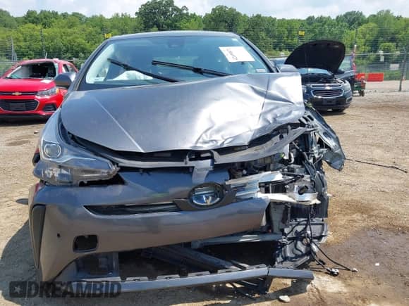 2022 Toyota Prius L Eco with VIN JTDKAMFU5N3160758, listed as a IAAI auction lot 42699871 with 64,403 mi miles and . Bid and sale history available at DreamBid. Image 12.