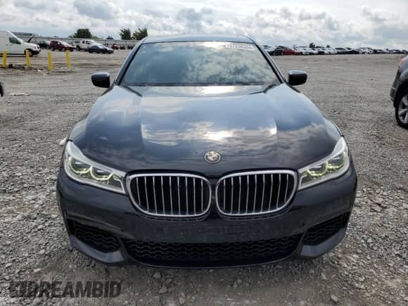 2016 BMW 7 Series 750i with VIN WBA7F0C53GGM20760, listed as a Copart auction lot 57230334 with 77,588 mi miles and Salvage title. Bid and sale history available at DreamBid. Image 5.