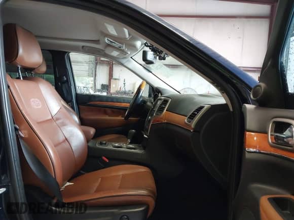 2012 Jeep Grand Cherokee Overland z VIN 1C4RJFCG1CC262788, wystawiony jako IAAI lot #43212743 z przebiegiem 211 731 mil mil oraz . Historia ofert i sprzedaży dostępna na DreamBid. Obrazek 5.