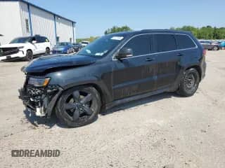2016 Jeep Grand Cherokee Overland with VIN 1C4RJFCG7GC302474, listed as a Copart auction lot 69121855 with 180,331 mi miles and Salvage title. Bid and sale history available at DreamBid. Image 1.