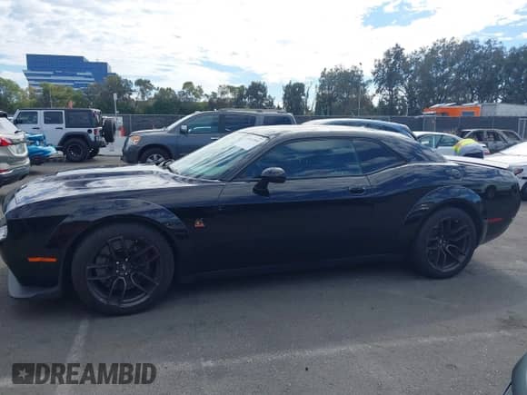 2021 Dodge Challenger R/T Scat Pack Widebody with VIN 2C3CDZFJ7MH677011, listed as a IAAI auction lot 43412091 with 26,783 mi miles and . Bid and sale history available at DreamBid. Image 15.