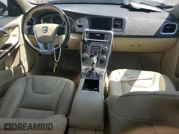 2015 Volvo S60 T5 Drive-E Premier with VIN YV140MFK6F2336518, listed as a Copart auction lot 68339405 with 142,401 mi miles and Salvage title. Bid and sale history available at DreamBid. Image 8.