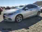 2018 Chevrolet Cruze Premier с VIN 3G1BF6SM3JS615011, выставлен на аукционе Copart как лот 86972635 с пробегом 115 684 миль миль и Списание • Salvage title. История ставок и продаж доступна на DreamBid. Изображение 1.