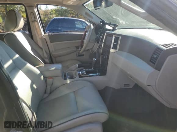 2009 Jeep Grand Cherokee with VIN 1J8HR68T19C550936, listed as a Copart auction lot 80090724 with 113,543 mi miles and Salvage title. Bid and sale history available at DreamBid. Image 7.