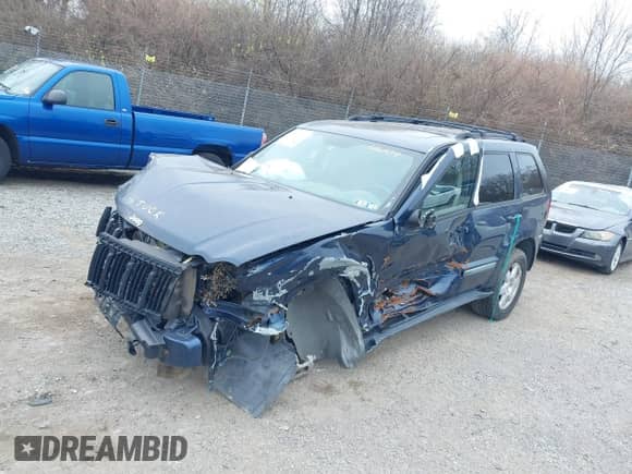 2009 Jeep Grand Cherokee Laredo with VIN 1J8GR48K49C516237, listed as a IAAI auction lot 34603333 with Not provided miles and . Bid and sale history available at DreamBid. Image 2.