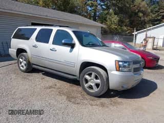 2009 Chevrolet Suburban LTZ z VIN 1GNFK363X9R189568, wystawiony jako IAAI lot #43251361 z przebiegiem 214 783 mil mil oraz . Historia ofert i sprzedaży dostępna na DreamBid. Obrazek 1.