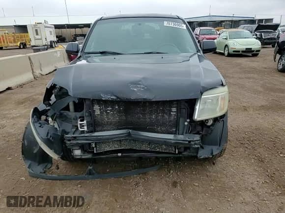 2008 Mercury Mariner Premier with VIN 4M2CU97188KJ32728, listed as a Copart auction lot 70736905 with 217,659 mi miles and Salvage title. Bid and sale history available at DreamBid. Image 15.