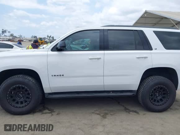 2020 Chevrolet Tahoe LT with VIN 1GNSCBKC0LR290170, listed as a IAAI auction lot 42129712 with 57,414 mi miles and . Bid and sale history available at DreamBid. Image 14.