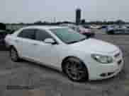 2012 Chevrolet Malibu LTZ with VIN 1G1ZG5E79CF101635, listed as a Copart auction lot 62196335 with 170,219 mi miles and Salvage title. Bid and sale history available at DreamBid. Image 4.