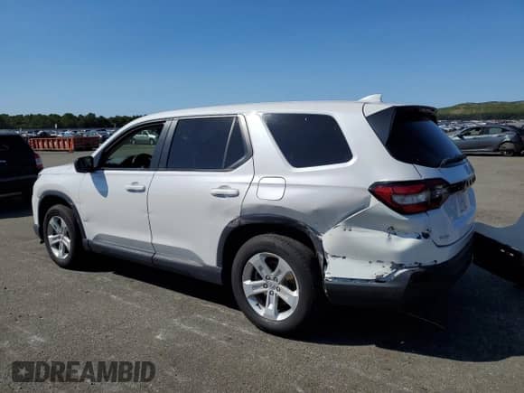 2023 Honda Pilot LX с VIN 5FNYG1H24PB023156, выставлен на аукционе Copart как лот 69509214 с пробегом 26 305 миль миль и Списание • Salvage title. История ставок и продаж доступна на DreamBid. Изображение 2.