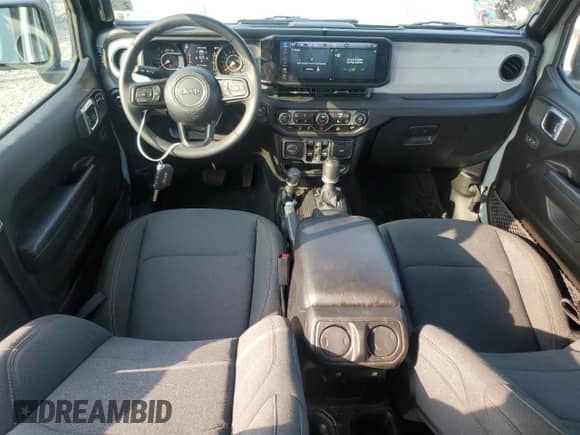 2024 Jeep Wrangler Sport S with VIN 1C4PJXDG6RW257105, listed as a Copart auction lot 66905825 with 58,376 mi miles and Salvage title. Bid and sale history available at DreamBid. Image 8.