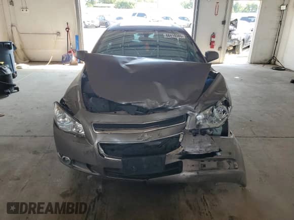 2010 Chevrolet Malibu LTZ with VIN 1G1ZE5EB9A4119121, listed as a Copart auction lot 68419385 with 190,784 mi miles and Salvage title. Bid and sale history available at DreamBid. Image 5.
