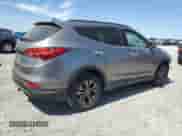 2014 Hyundai Santa Fe z VIN 5XYZUDLB6EG208076, wystawiony jako Copart lot #71499775 z przebiegiem 138 162 mil mil oraz Szkoda całkowita • Salvage title. Historia ofert i sprzedaży dostępna na DreamBid. Obrazek 3.