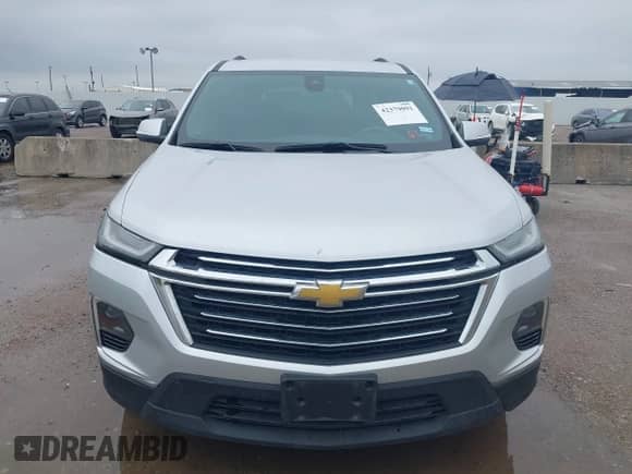 2022 Chevrolet Traverse LT Cloth z VIN 1GNERGKW9NJ160988, wystawiony jako IAAI lot #42379091 z przebiegiem 57 689 mil mil oraz . Historia ofert i sprzedaży dostępna na DreamBid. Obrazek 12.