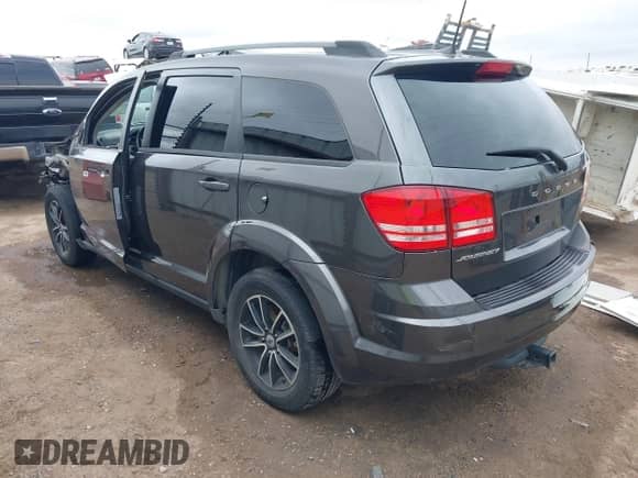 2018 Dodge Journey SE with VIN 3C4PDCAB7JT445179, listed as a IAAI auction lot 43363807 with 127,451 mi miles and . Bid and sale history available at DreamBid. Image 3.