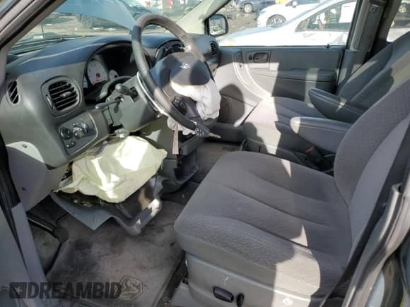 2007 Dodge Grand Caravan SXT z VIN 2D4GP44LX7R284598, wystawiony jako Copart lot #87063065 z przebiegiem 97 332 mil mil oraz Czysty tytuł • Clean title. Historia ofert i sprzedaży dostępna na DreamBid. Obrazek 7.