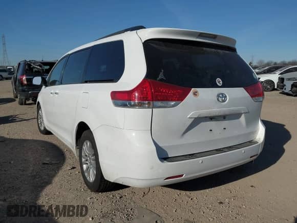 2013 Toyota Sienna XLE AAS with VIN 5TDYK3DC3DS308298, listed as a IAAI auction lot 41292280 with 165,638 mi miles and . Bid and sale history available at DreamBid. Image 3.