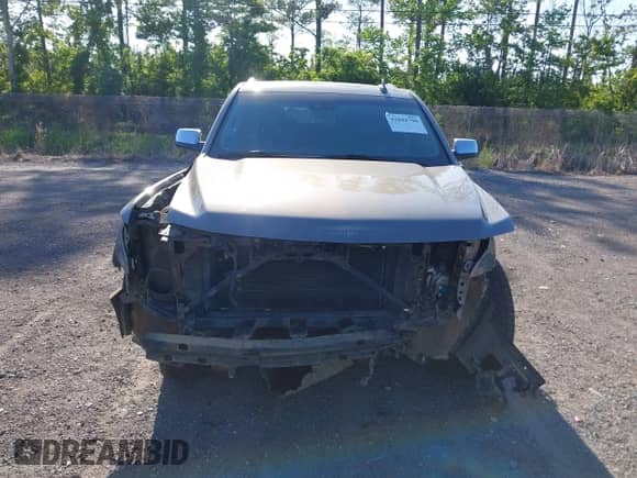 2019 Chevrolet Suburban Premier with VIN 1GNSCJKC3KR129739, listed as a IAAI auction lot 42044708 with 105,771 mi miles and . Bid and sale history available at DreamBid. Image 12.