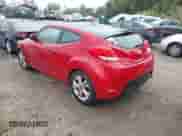 2012 Hyundai Veloster w/Gray Int z VIN KMHTC6AD1CU054540, wystawiony jako IAAI lot #43437087 z przebiegiem 173 534 mil mil oraz . Historia ofert i sprzedaży dostępna na DreamBid. Obrazek 3.