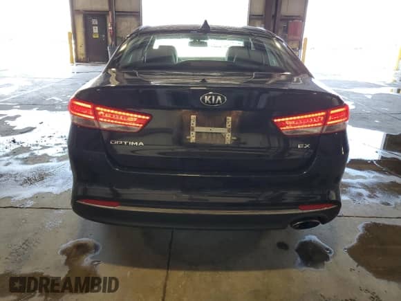 2016 Kia Optima EX with VIN 5XXGU4L31GG095791, listed as a Copart auction lot 70002625 with 111,620 mi miles and Salvage title. Bid and sale history available at DreamBid. Image 6.