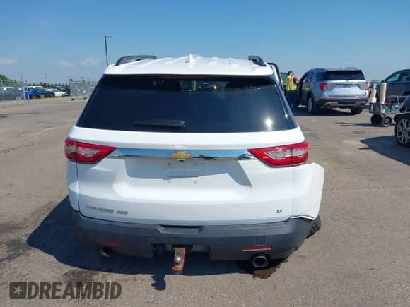 2019 Chevrolet Traverse LT Cloth with VIN 1GNEVGKW0KJ118037, listed as a IAAI auction lot 42976267 with 68,719 mi miles and . Bid and sale history available at DreamBid. Image 16.