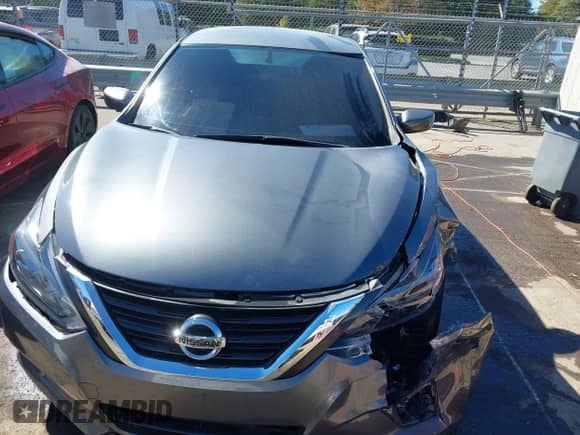 2016 Nissan Altima S with VIN 1N4AL3AP0GN390979, listed as a IAAI auction lot 43448205 with 137,554 mi miles and . Bid and sale history available at DreamBid. Image 12.