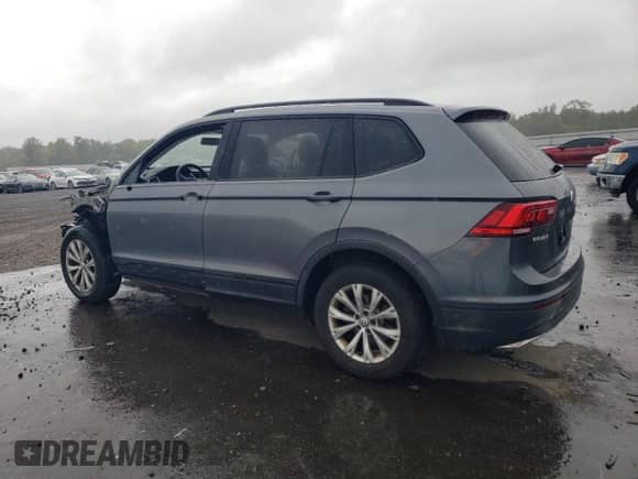 2018 Volkswagen Tiguan S с VIN 3VV0B7AX2JM017073, выставлен на аукционе Copart как лот 71991035 с пробегом 79 830 миль миль и Списание • Salvage title. История ставок и продаж доступна на DreamBid. Изображение 2.