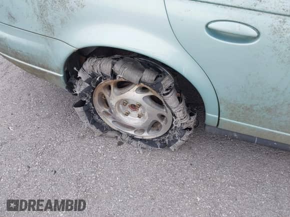 1996 Saturn SL with VIN 1G8ZK5277TZ340863, listed as a IAAI auction lot 42513568 with 130,286 mi miles and . Bid and sale history available at DreamBid. Image 6.