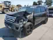 2011 Honda Pilot Touring with VIN 5FNYF3H9XBB041665, listed as a Copart auction lot 70728095 with 198,665 mi miles and Salvage title. Bid and sale history available at DreamBid. Image 1.