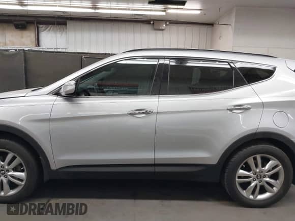 2013 Hyundai Santa Fe Sport z VIN 5XYZUDLA7DG095597, wystawiony jako IAAI lot #42931769 z przebiegiem 105 858 mil mil oraz . Historia ofert i sprzedaży dostępna na DreamBid. Obrazek 15.