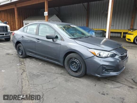 2018 Subaru Impreza with VIN 4S3GKAA65J1607654, listed as a Copart auction lot 58768765 with 62,275 mi miles and Salvage title. Bid and sale history available at DreamBid. Image 4.