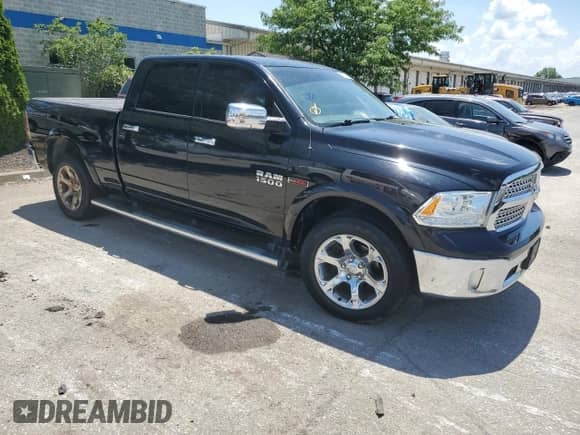 2014 Ram 1500 Laramie z VIN 1C6RR7VM8ES272915, wystawiony jako Copart lot #63770515 z przebiegiem 213 272 mil mil oraz Czysty tytuł • Clean title. Historia ofert i sprzedaży dostępna na DreamBid. Obrazek 4.
