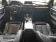 2015 BMW 4 Series 428i xDrive z VIN WBA4A7C5XFD415680, wystawiony jako Copart lot #71206405 z przebiegiem 102 612 mil mil oraz Szkoda całkowita • Salvage title. Historia ofert i sprzedaży dostępna na DreamBid. Obrazek 8.