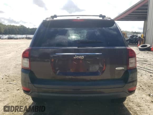 2014 Jeep Compass Latitude with VIN 1C4NJCEA4ED643134, listed as a Copart auction lot 71044335 with 103,025 mi miles and Salvage title. Bid and sale history available at DreamBid. Image 6.