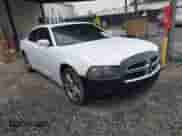 2013 Dodge Charger SXT with VIN 2C3CDXJG8DH528767, listed as a IAAI auction lot 41627596 with 204,619 mi miles and . Bid and sale history available at DreamBid. Image 1.