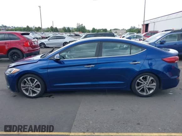 2017 Hyundai Elantra SE z VIN 5NPD84LF6HH041555, wystawiony jako IAAI lot #42277973 z przebiegiem 141 830 mil mil oraz . Historia ofert i sprzedaży dostępna na DreamBid. Obrazek 14.