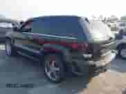 2009 Jeep Grand Cherokee with VIN 1J8HR78W49C550879, listed as a IAAI auction lot 41279386 with 126,314 mi miles and . Bid and sale history available at DreamBid. Image 3.