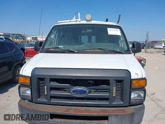 2013 Ford Econoline Cargo Commercial with VIN 1FTNE1EW9DDA23480, listed as a IAAI auction lot 43153781 with 176,335 mi miles and . Bid and sale history available at DreamBid. Image 12.