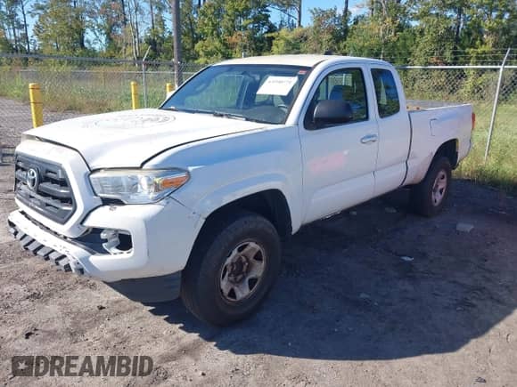 2016 Toyota Tacoma SR with VIN 5TFRX5GN4GX058969, listed as a IAAI auction lot 43590771 with 237,437 mi miles and . Bid and sale history available at DreamBid. Image 2.