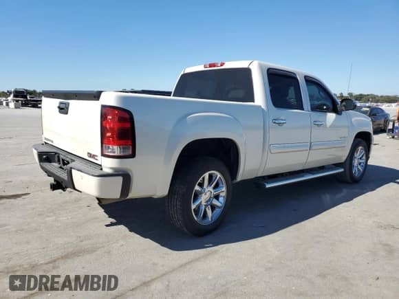 2012 GMC Sierra 1500 Denali with VIN 3GTP1XE2XCG236069, listed as a Copart auction lot 76631704 with 216,877 mi miles and Salvage title. Bid and sale history available at DreamBid. Image 3.