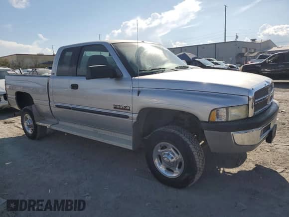 2001 Dodge 2500 with VIN 3B7KF23701G820913, listed as a Copart auction lot 71560975 with 60,430 mi miles and Salvage title. Bid and sale history available at DreamBid. Image 4.