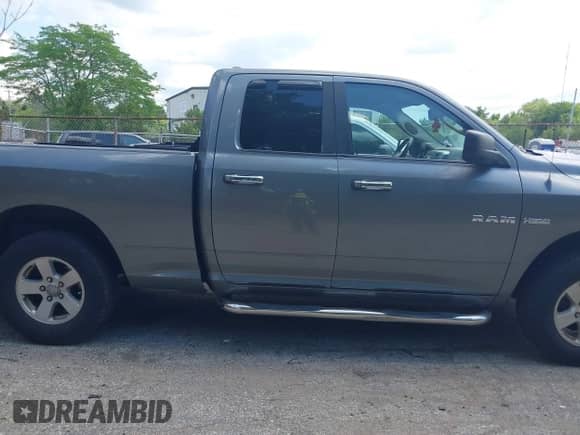2009 Dodge 1500 SLT with VIN 1D3HV18T59S801024, listed as a IAAI auction lot 42561739 with 197,026 mi miles and . Bid and sale history available at DreamBid. Image 13.