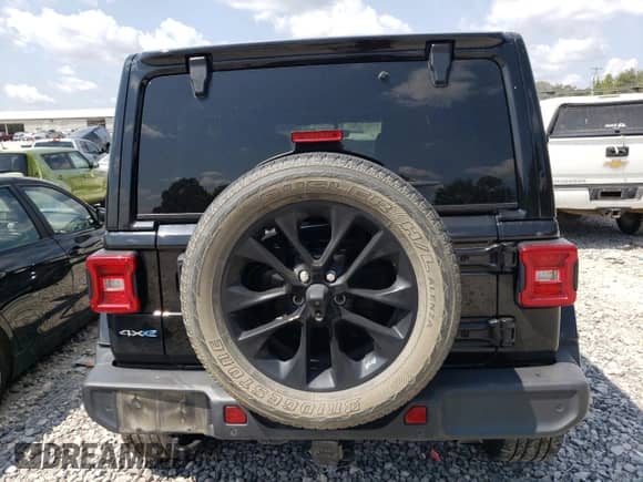 2021 Jeep Wrangler Unlimited Sahara with VIN 1C4JJXP66MW642682, listed as a Copart auction lot 80336735 with 55,596 mi miles and Salvage title. Bid and sale history available at DreamBid. Image 6.
