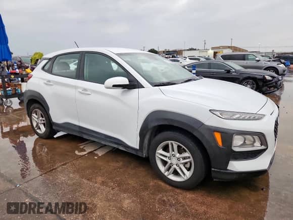 2019 Hyundai Kona SE with VIN KM8K12AA8KU282811, listed as a Copart auction lot 82130055 with 122,132 mi miles and Salvage title. Bid and sale history available at DreamBid. Image 4.