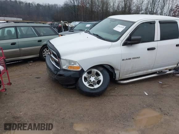 2011 Ram 1500 ST with VIN 1D7RV1CP9BS658338, listed as a IAAI auction lot 41463978 with 165,421 mi miles and . Bid and sale history available at DreamBid. Image 6.